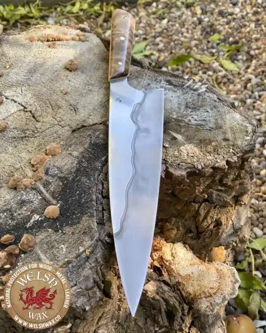 Jamie Nerkowski custom made knife on log bespoke finish